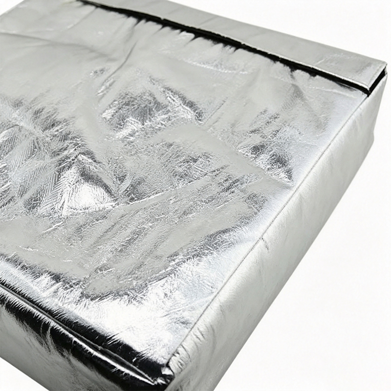 Värmereflekterande aluminiumfoliesvetsning på knä