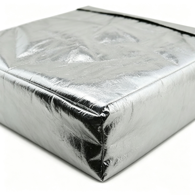 Värmereflekterande aluminiumfoliesvetsning på knä